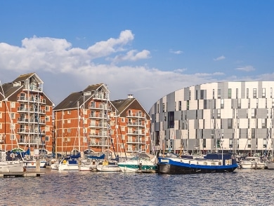 Ipswich waterfront with apartment buildings and moored boats