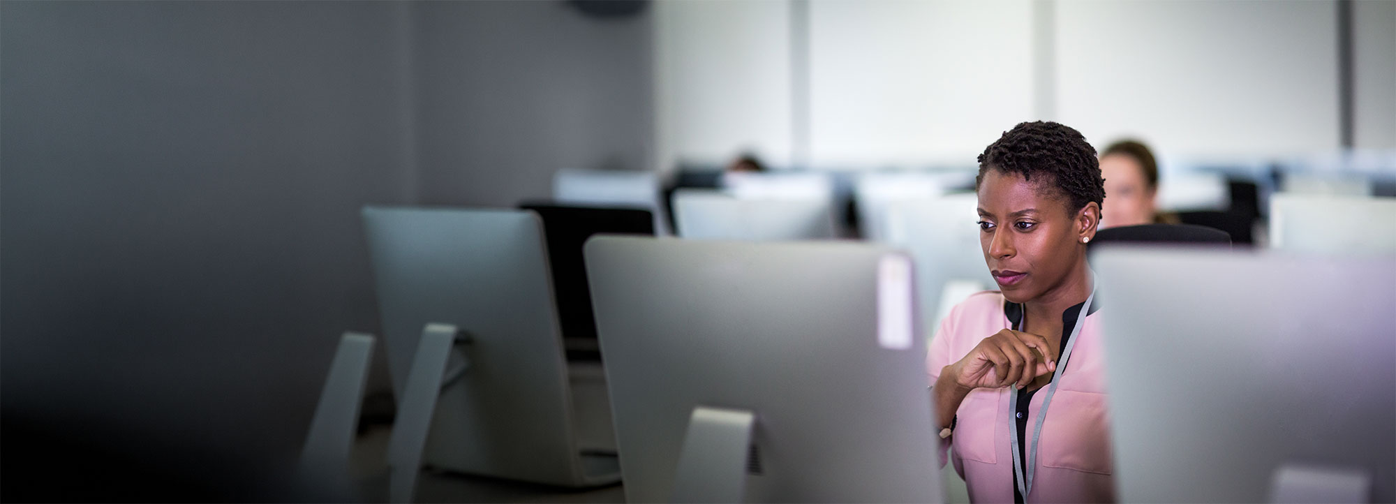 Contact centre agent concentrating at their desk